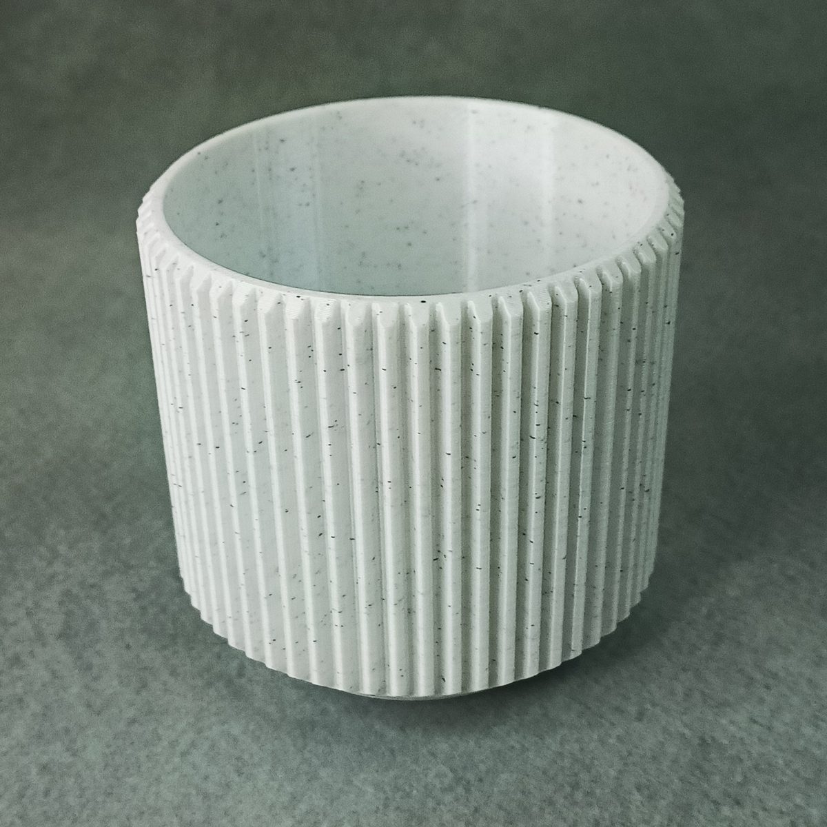3D printed marble texture flower pot with a drainage hole