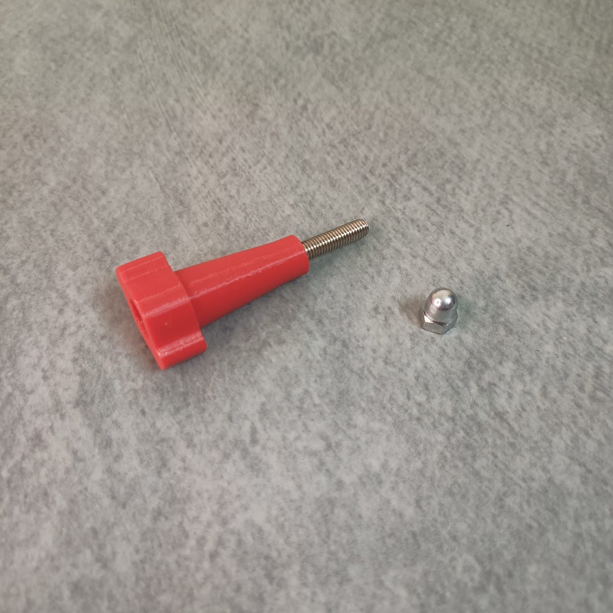 Long M5 thumb screw with wide hand grip and cap nut for action camera mounts