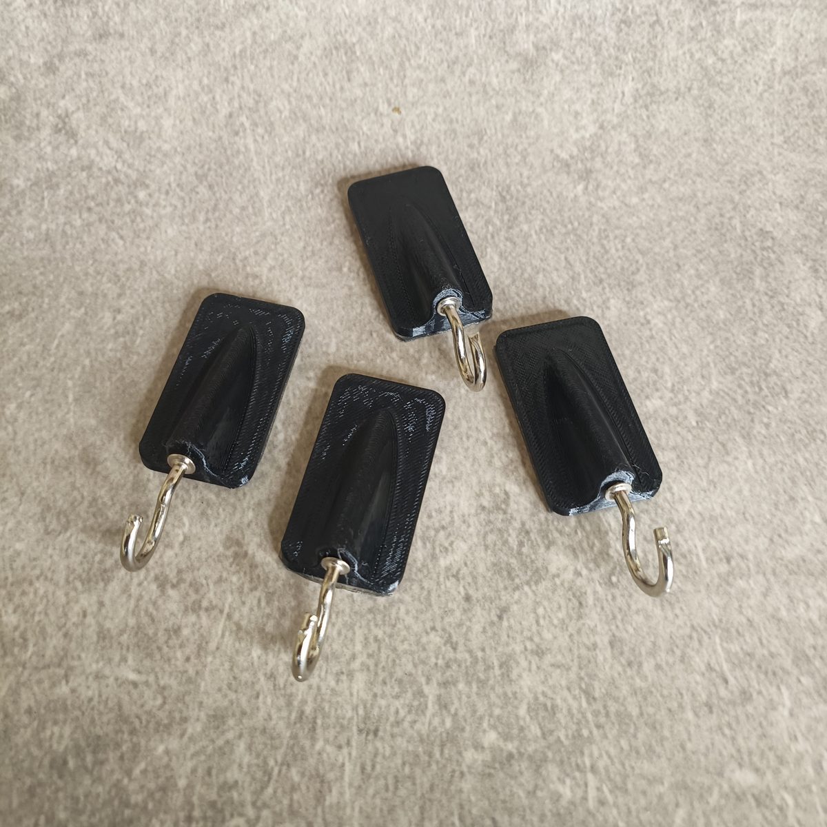 Set of four wall hooks