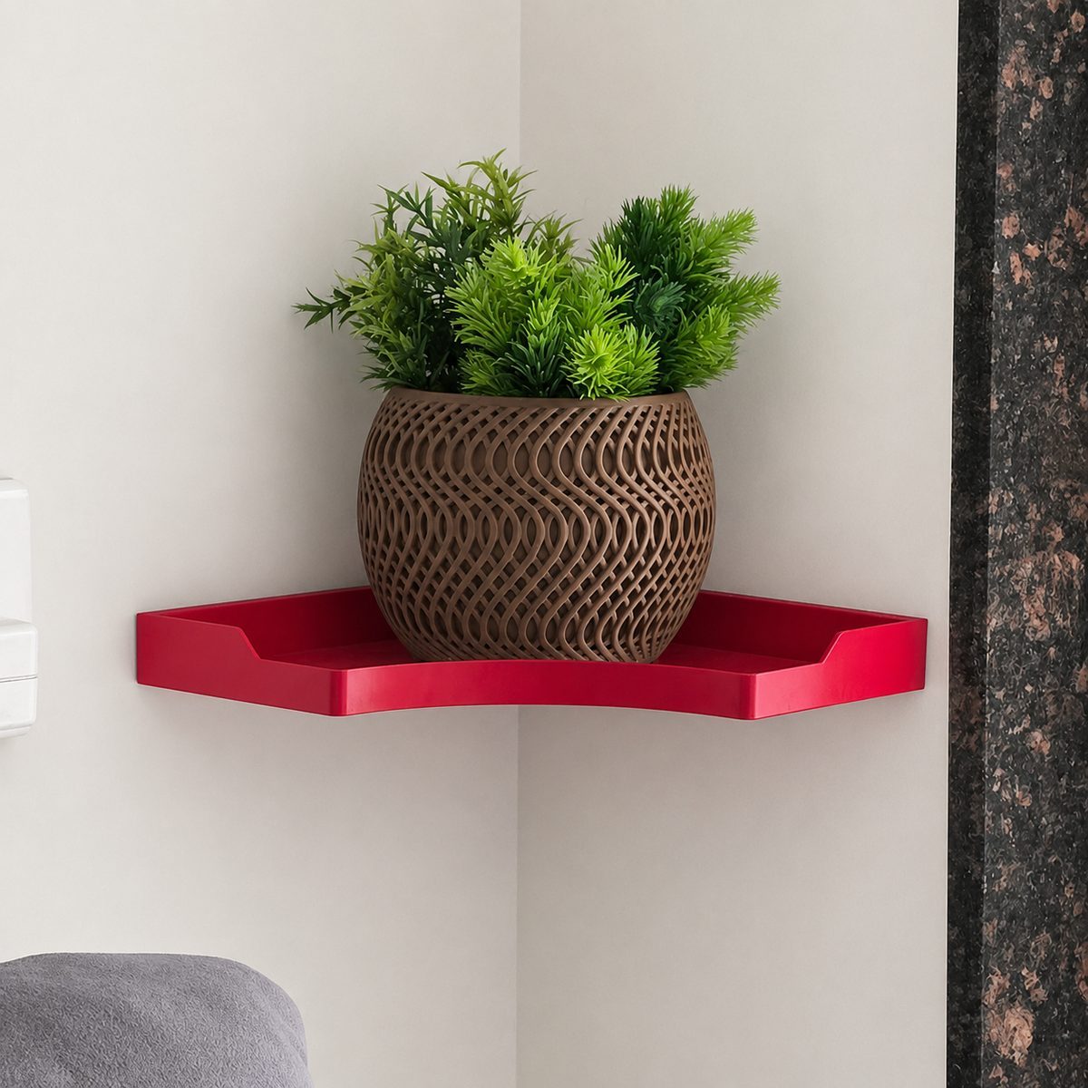 Floating corner shelf with raised edge mounted in a wall corner